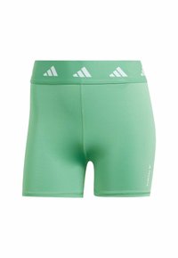 Gröna sportshorts i mjukt, stretchigt tyg. Har en bred midjeresår med vita logodetaljer och en åtsittande design för komfort.