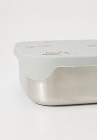 Stainless steel food container with a light gray lid featuring a patterned design of vehicles and waves. Rounded edges, smooth texture.