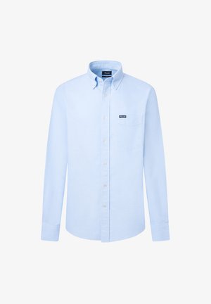 Lichtblauw overhemd met lange mouwen, een enkele borstzak en een merketiket op de zak. Glad katoen.