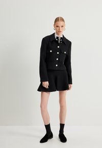 Koton Lichte jas - black