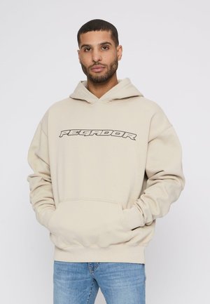 Beige hoodie with a large "PEGAJOR" graphic in black, featuring a drawstring hood and front pocket. Soft fabric and relaxed fit.