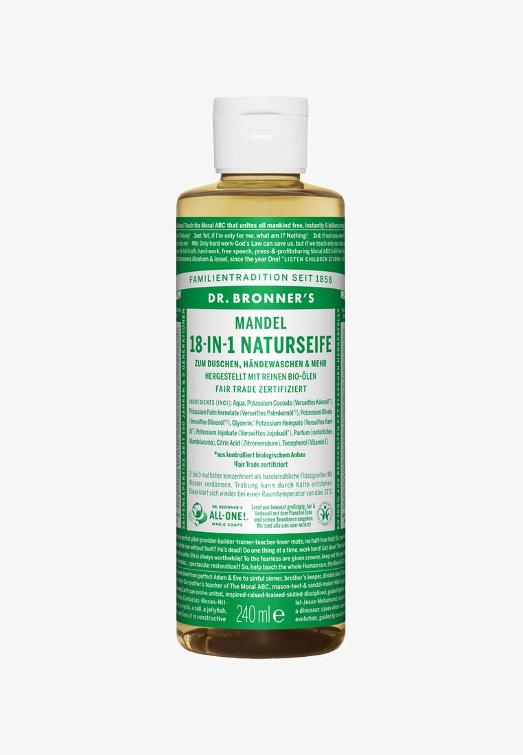 Heldere fles van Dr. Bronner's 18-in-1 natuurlijke zeep. Groene en witte label met tekst in het Duits. Formaat: 240 ml. Flip-top dop. Vloeistof lijkt lichtbruin.