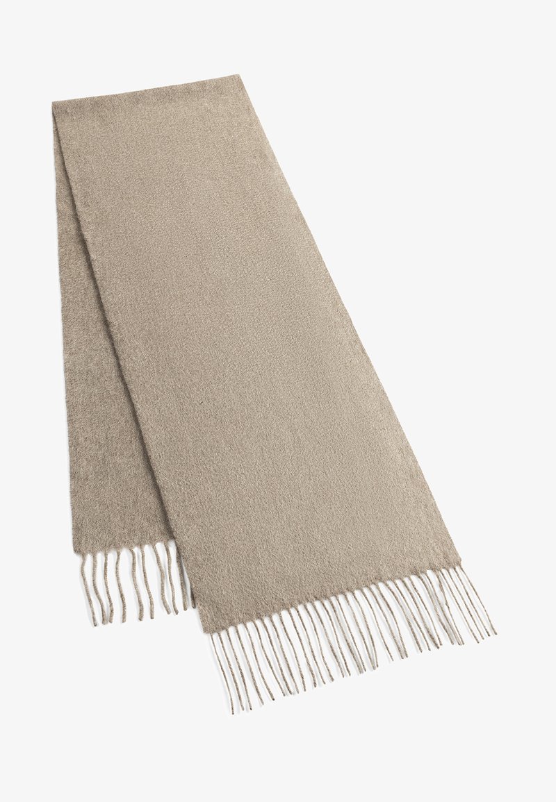 Beige scarf made of soft material, featuring a smooth texture and fringed ends. Rectangular shape with uniform color and minimal detailing.