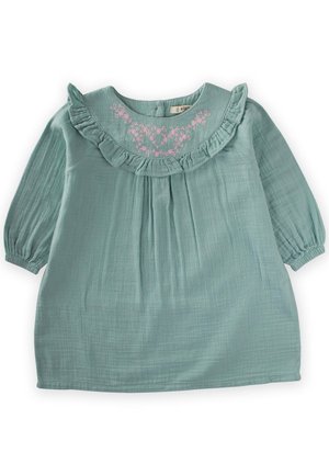 Türkisfarbenes langärmeliges Kleid mit Rüschensaum, das pinkfarbene Blumenstickerei entlang des Ausschnitts aufweist, aus weichem, strukturiertem Stoff gefertigt.