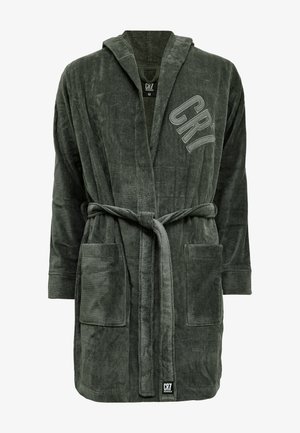 Grøn badekåbe i frotté med hætte, som har en bæltestrop i taljen, to forlommer og et struktureret stof. CR7-logo i dekorativ syning.