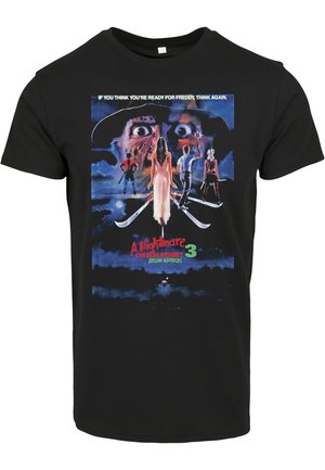 Black cotton t-shirt featuring a graphic print from "A Nightmare on Elm Street 3," with bold colors and horror-themed imagery.