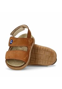 Sandali in pelle marrone con cinturini in Velcro, soletta testurizzata e suola in gomma con un motivo a griglia. Design leggero e aperto.