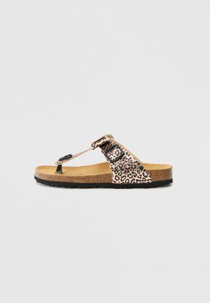Leopardmønstret slidsandal med korksål, sort rem og justerbar spænde. Tekstureret overflade med flad gummiydersål.
