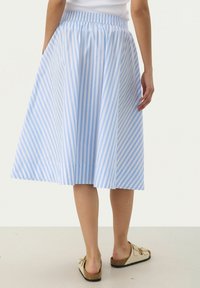 Blue and white striped skirt with a flared design, elastic waistband, and knee-length finish. Made from lightweight fabric, smooth texture.