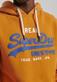 Superdry & Co VINTAGE LOGO CLASSIC - Sweatshirt - thrift gold marl