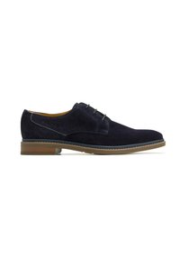 Chaussure oxford en daim bleu marine avec un bout arrondi, un laçage, des coutures contrastées et une semelle en caoutchouc marron.