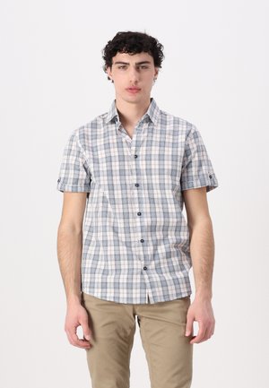 Chemise à manches courtes à carreaux bleus et blancs. Présente un col classique, des boutons noirs et un ourlet droit.