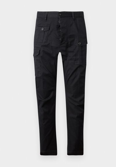 Black cargo pants made of durable fabric, featuring multiple pockets, a button fly, and a straight leg design. Smooth texture and matte finish.