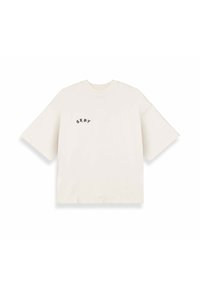 Hellbeige übergroßes T-Shirt aus Baumwolle, mit kurzen Ärmeln und einem kleinen schwarzen "GRNY"-Logo auf der linken Seite.