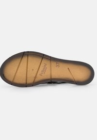 Suola nera della sandal con suola in gomma testurizzata, inserto in legno sagomato e misura 37 contrassegnata. Presenta linee curve e un modello di battistrada completo.