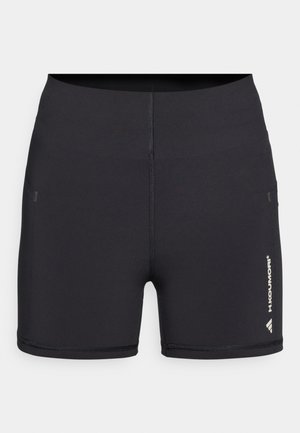 Sorte atletikshorts lavet af elastisk stof med tætsiddende design, to sidelommer og hvidt mærke på venstre ben.