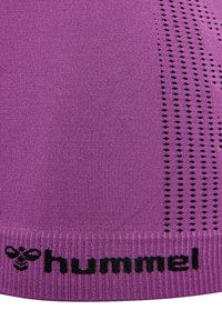 Purple sports top featuring ribbed texture, black logo at the hem, and striped pattern on the side for ventilation.