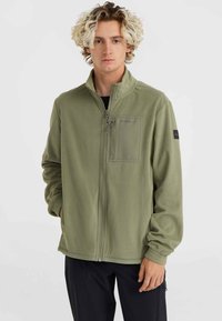 Green fleece jacket with a zip front, high collar, and chest pocket. Features a logo on the pocket and ribbed cuffs. Soft texture.