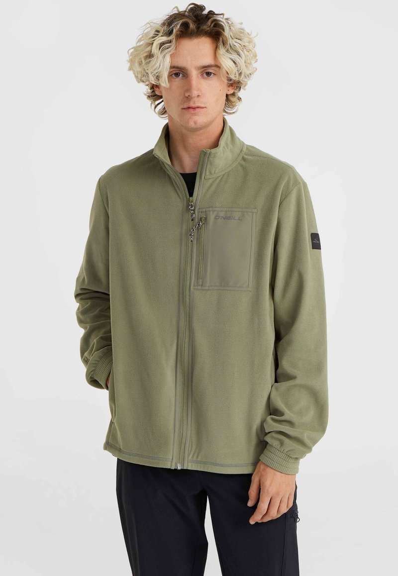 Green fleece jacket with a zip front, high collar, and chest pocket. Features a logo on the pocket and ribbed cuffs. Soft texture.