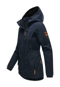 Navy blue parka jacket with a textured exterior, fur-lined hood, adjustable drawstrings, and multiple pockets with branded accents.