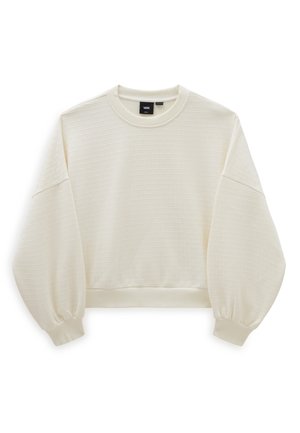 Pull à col rond à manches longues texturé blanc cassé, épaules tombantes, poignets élastiques, ourlet raccourci et étiquette de marque Vans à l'intérieur du col.