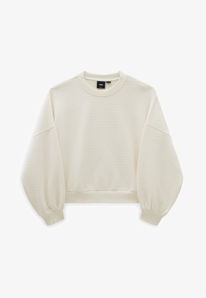 Pull à col rond à manches longues texturé blanc cassé, épaules tombantes, poignets élastiques, ourlet raccourci et étiquette de marque Vans à l'intérieur du col.
