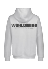 Weißer Hoodie mit dem Schriftzug "WORLDWIDE" in fettem schwarzem Text auf der Rückseite, darunter in kleinerer Schrift "SUBLEVEL COLLECTION · TRUE TO YOURSELF". Sportliches Design.