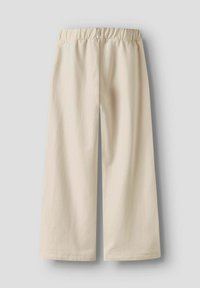 Cremfarbene weit geschnittene Hose aus weichem Stoff. Mit einem elastischen Bund und geraden Säumen. Keine sichtbaren Muster oder Beschläge.