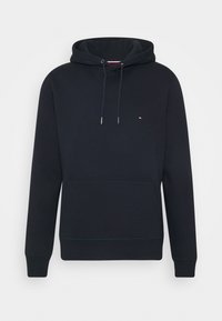 Sudadera color azul marino hecha de tela suave, con un bolsillo tipo canguro, cordones ajustables y un pequeño logo bordado en el pecho.
