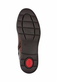 Scarpa in pelle marrone con una suola in gomma nera texturizzata, dotata di un inserto ammortizzante rosso e un motivo a nido d'ape per una migliore aderenza. Taglia 37.