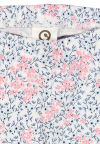 Vzorovaná látka s malými růžovými květinami a tmavě modrými listy na světlém pozadí. V horní části je elastický pas.