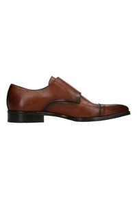 Chaussure slip-on en cuir marron avec un bout arrondi, ornée de coutures et d'une semelle en caoutchouc noir. Texture lisse, design minimal.