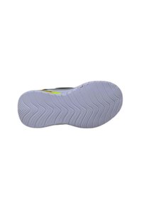 Suola della scarpa in materiale gommoso bianco, con un motivo ondulato. Accenti vivaci in giallo e arancione nella zona del tallone.