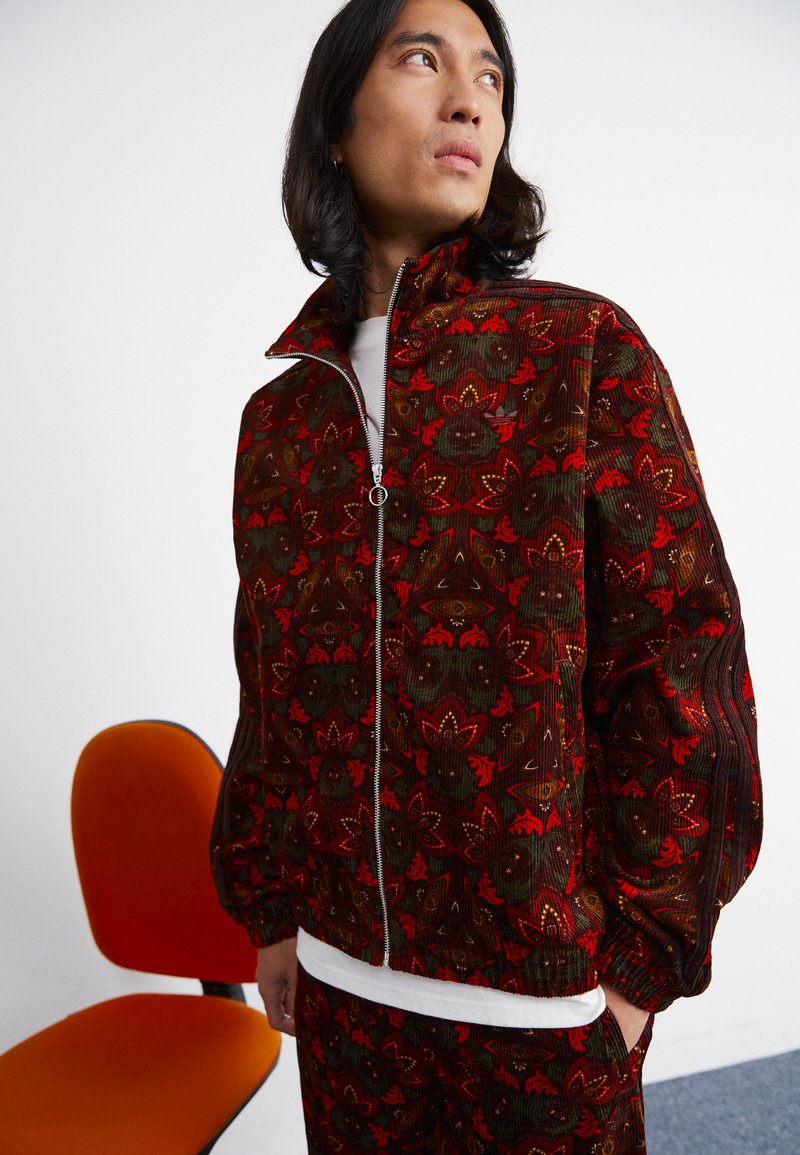 veste adidas noir et orange