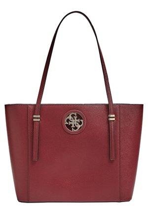 Burgundy leather tote bag with two shoulder straps and a circular metal logo emblem centered on the front.
