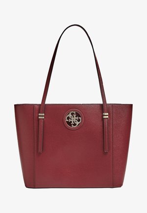 Bordeauxrode leren shopper met twee schouderbanden en een cirkelvormig metalen logo-embleem in het midden aan de voorkant.