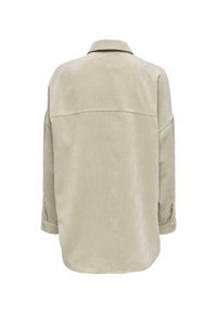 Hellbeige Cordhemd mit langen Ärmeln, Knopfmanschetten, Kragen und geradem Schnitt, mit vertikaler Ripptextur.