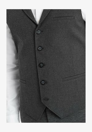 Grijze textuurvest met vijf zwarte knopen, geknipte revers en een voorzak. Het materiaal heeft een subtiel patroon dat de aansluitende pasvorm aanvult.