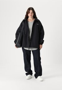 Nike Sportswear Lichte jas - black