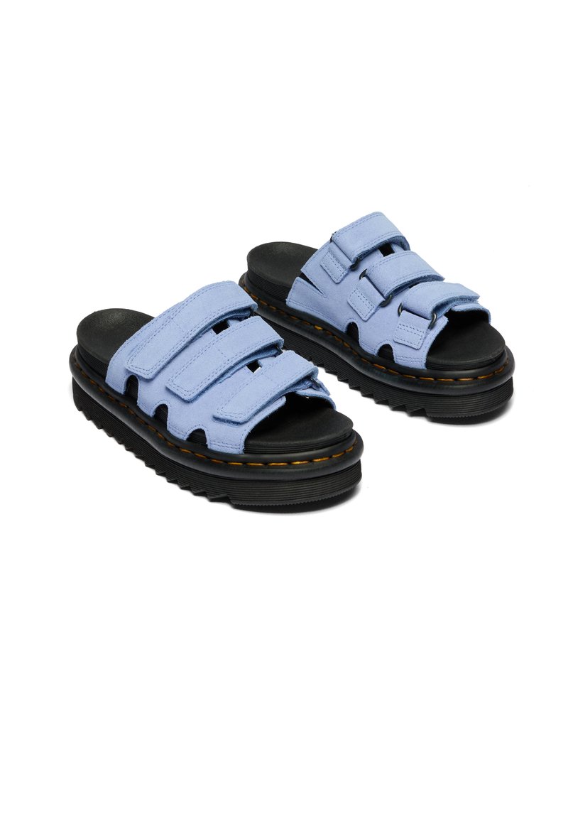 Pair of light blue sandals with three adjustable straps and thick black soles with yellow stitching.