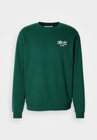 Donkergroene crewneck sweatshirt met witte tekst "coffee club MARC O'POLO DENIM" en koffieboon iconen op de linkerborst.