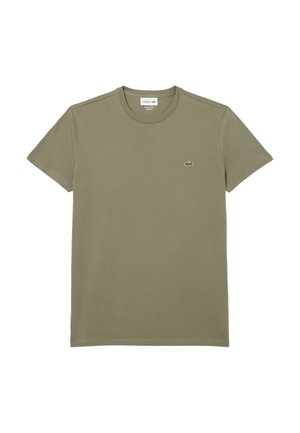 T-shirt in cotone verde con colletto a giro, maniche corte e piccolo logo Lacoste sul lato sinistro del petto. Tessuto morbido, design informale.