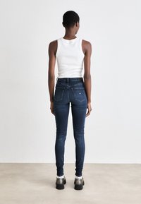 Tommy Jeans NORA - Jeans Skinny Fit - denim dark