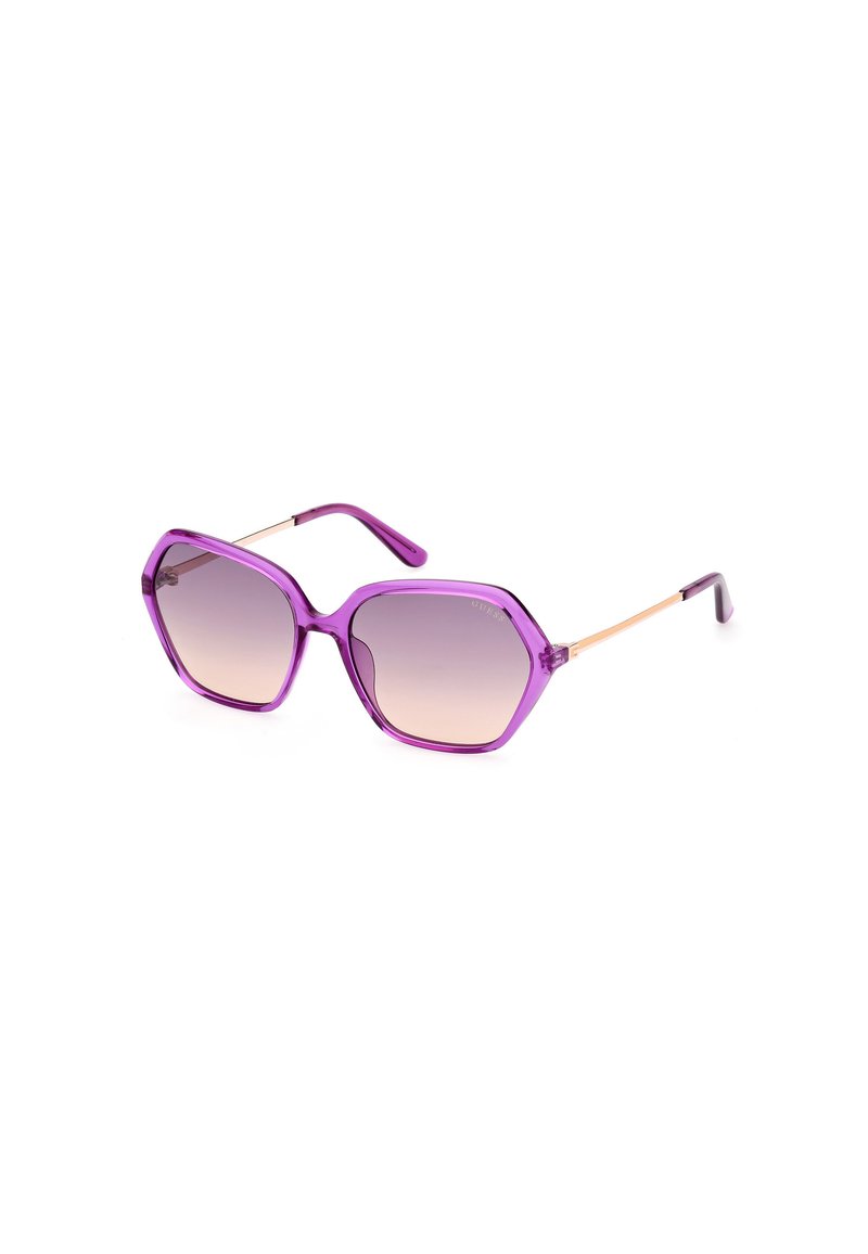 Occhiali da sole esagonali viola con lenti sfumate, dotati di montatura trasparente e dettagli metallici sulle aste.