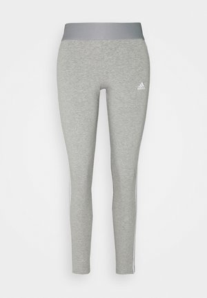 Gray athletic leggings with a wide gray waistband, featuring a white Adidas logo and contrasting white side stripes for added detail.