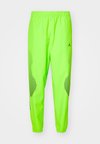 JORDAN SPORT JAM - Spodnji deli trenirk - electric green/black