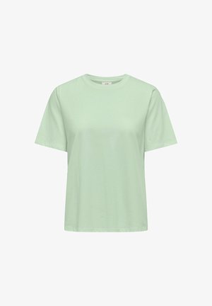 T-shirt verde menta realizzato in morbido cotone, con collo rotondo classico, maniche corte e taglio dritto. Senza fantasie né grafiche.