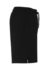 Shorts noirs en coton, dotés d'une taille élastique avec cordon de serrage, de poches latérales et d'une étiquette de marque sur l'ourlet.