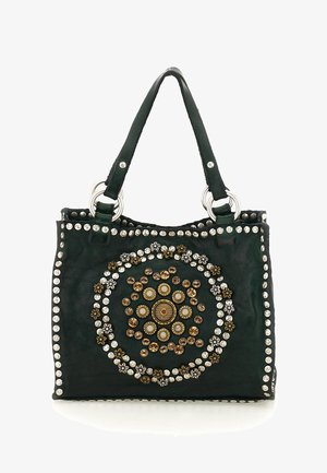 Borsa tote in pelle nera con doppi manici, decorata con cerchi concentrici di borchie argentate, dorate e perlate e ornamenti floreali.