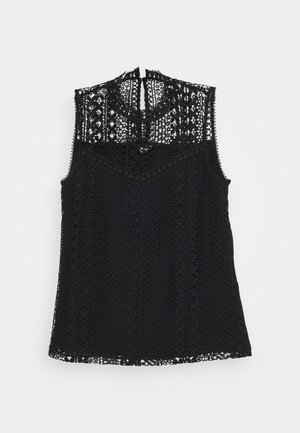 Top negro sin mangas con intrincados detalles de encaje, bordes en forma de ondas, cuello alto y patrones verticales a lo largo de la tela.